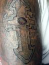 cross tattoos design on arm